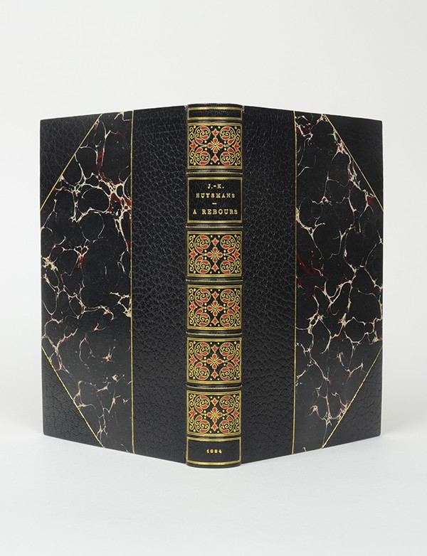 HUYSMANS Joris-Karl À rebours G. Charpentier et Cie 1884 édition originale reliure au dos décoré signée Vladimir Tchékéroul